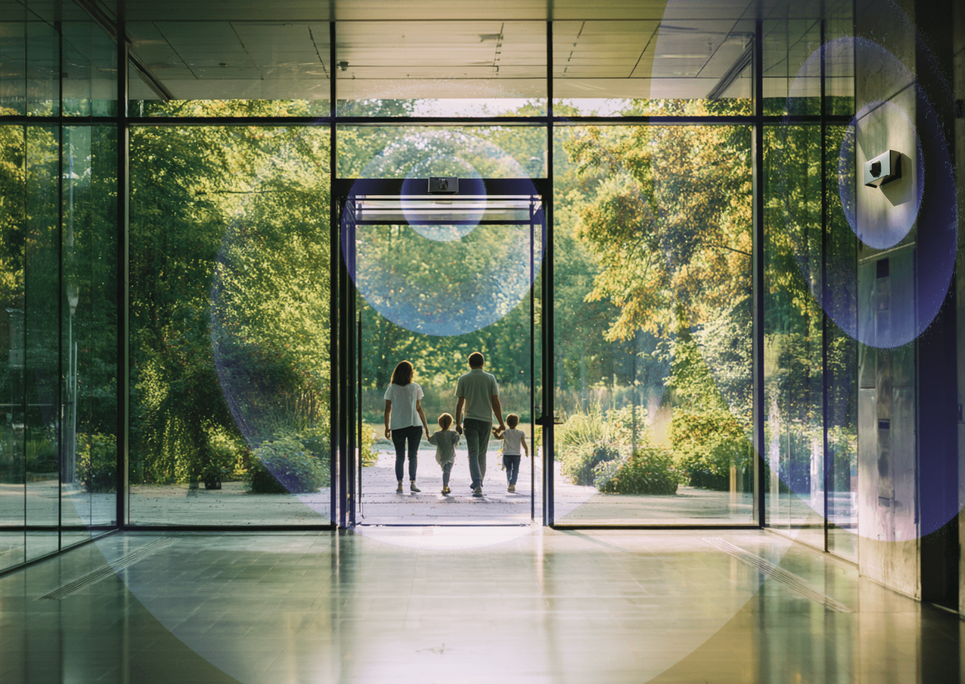 Family walking out of glass doors into a garden with defense technology radars